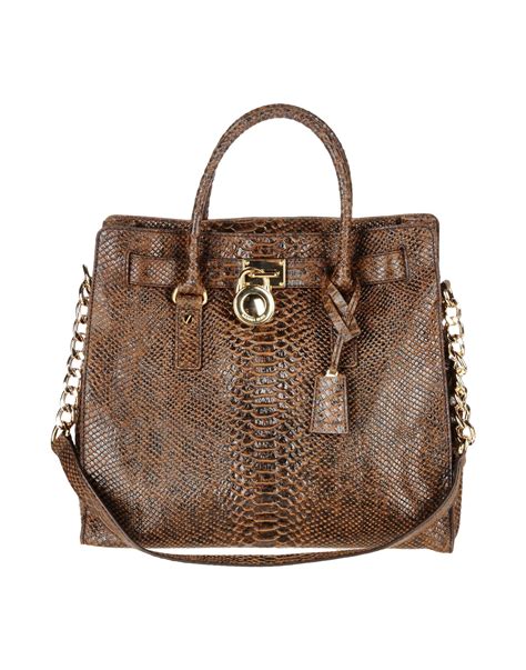 michael kors handbags white and brown|michael kors brown suede purse.